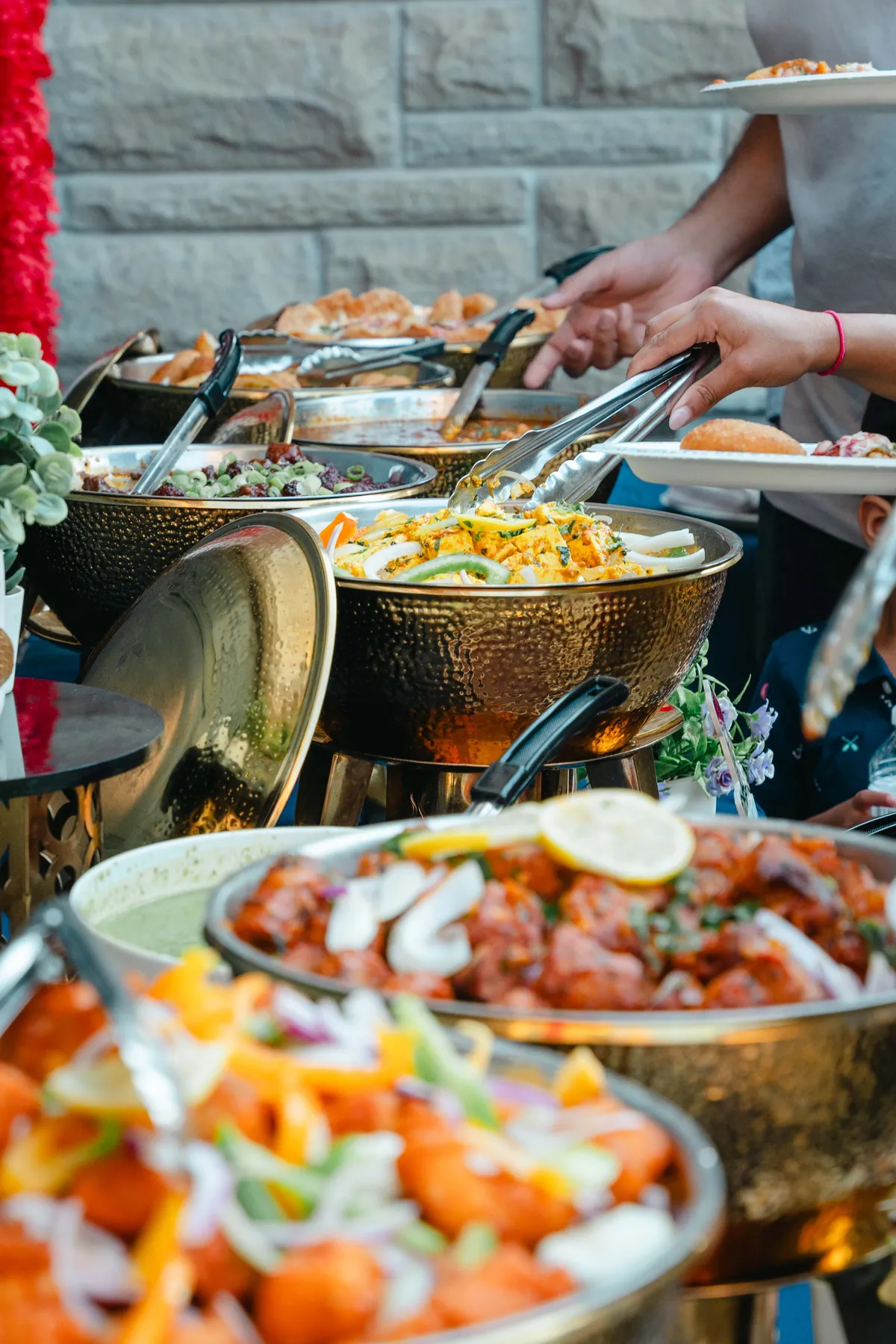 Food arranged for the celebration at Aaron’s Haldi celebration.