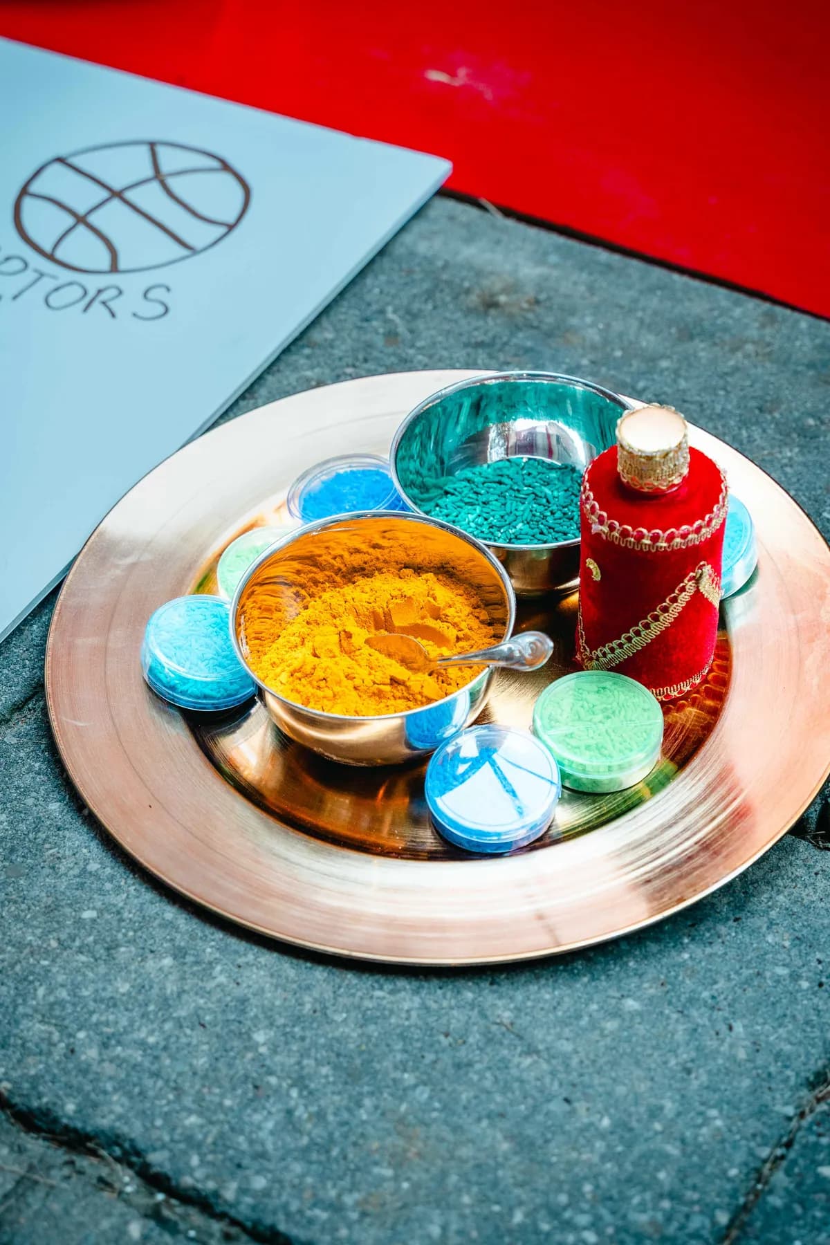 A tray of ceremonial colours at Aaron’s Haldi celebration.