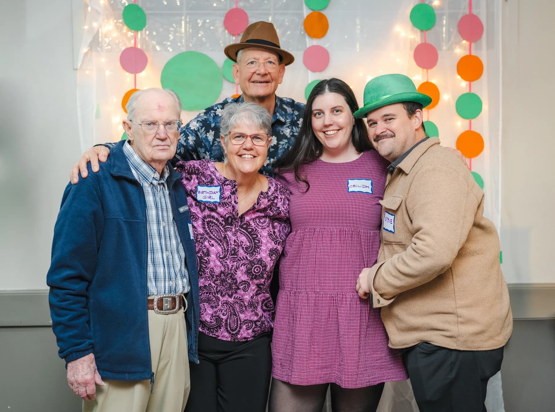 Guests posing together at Alison’s birthday celebration.