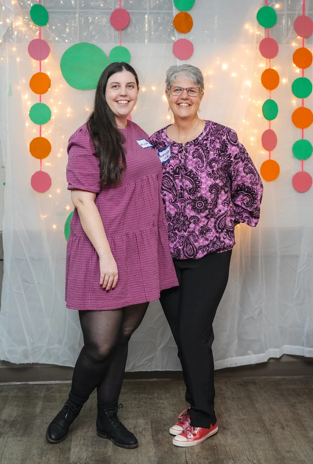 Two women posing together at Alison’s birthday celebration.