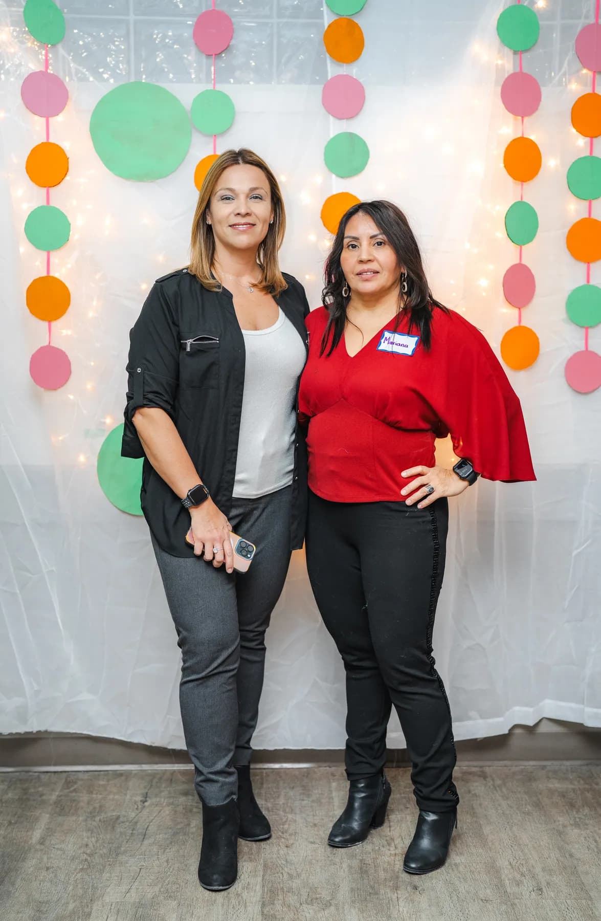 Two women posing together at Alison’s birthday celebration.