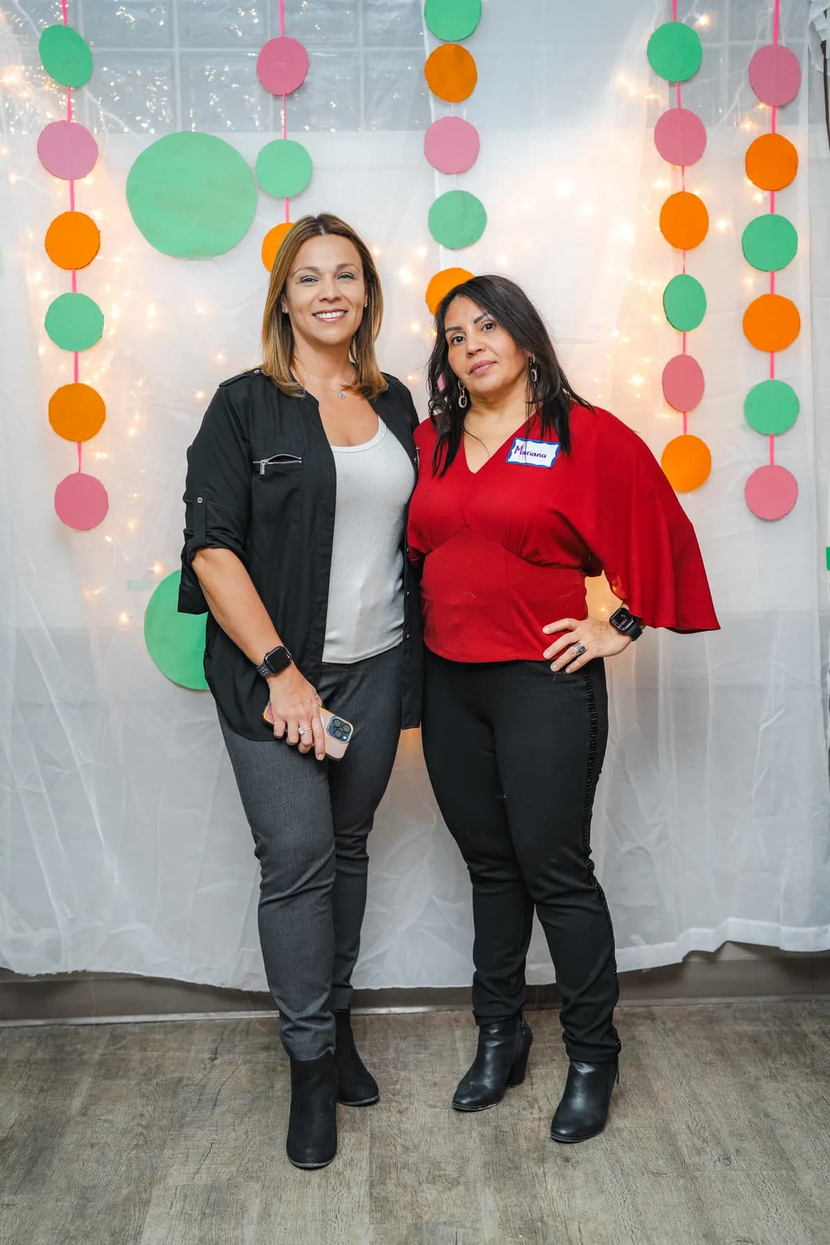 Two women posing together at Alison’s birthday celebration.