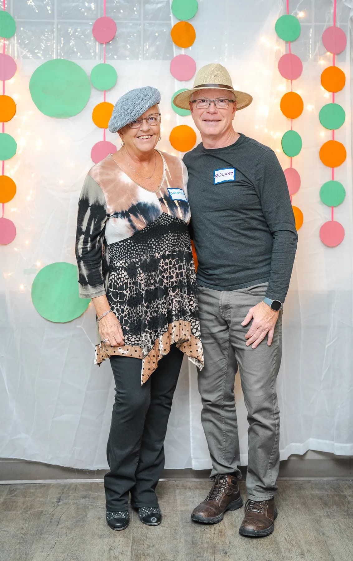 Two guests posing together at Alison’s birthday celebration.