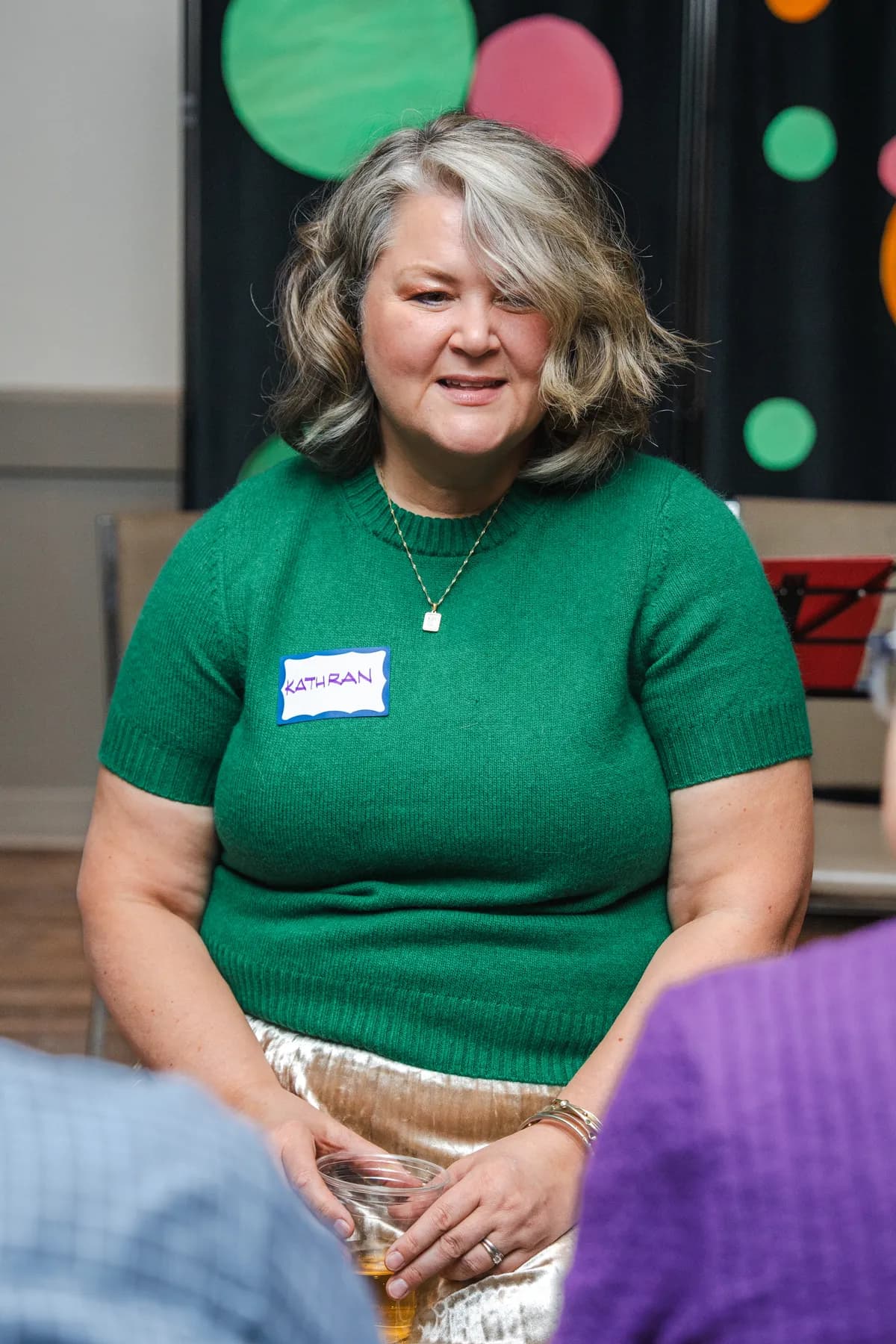 A seated guest at Alison’s birthday celebration.
