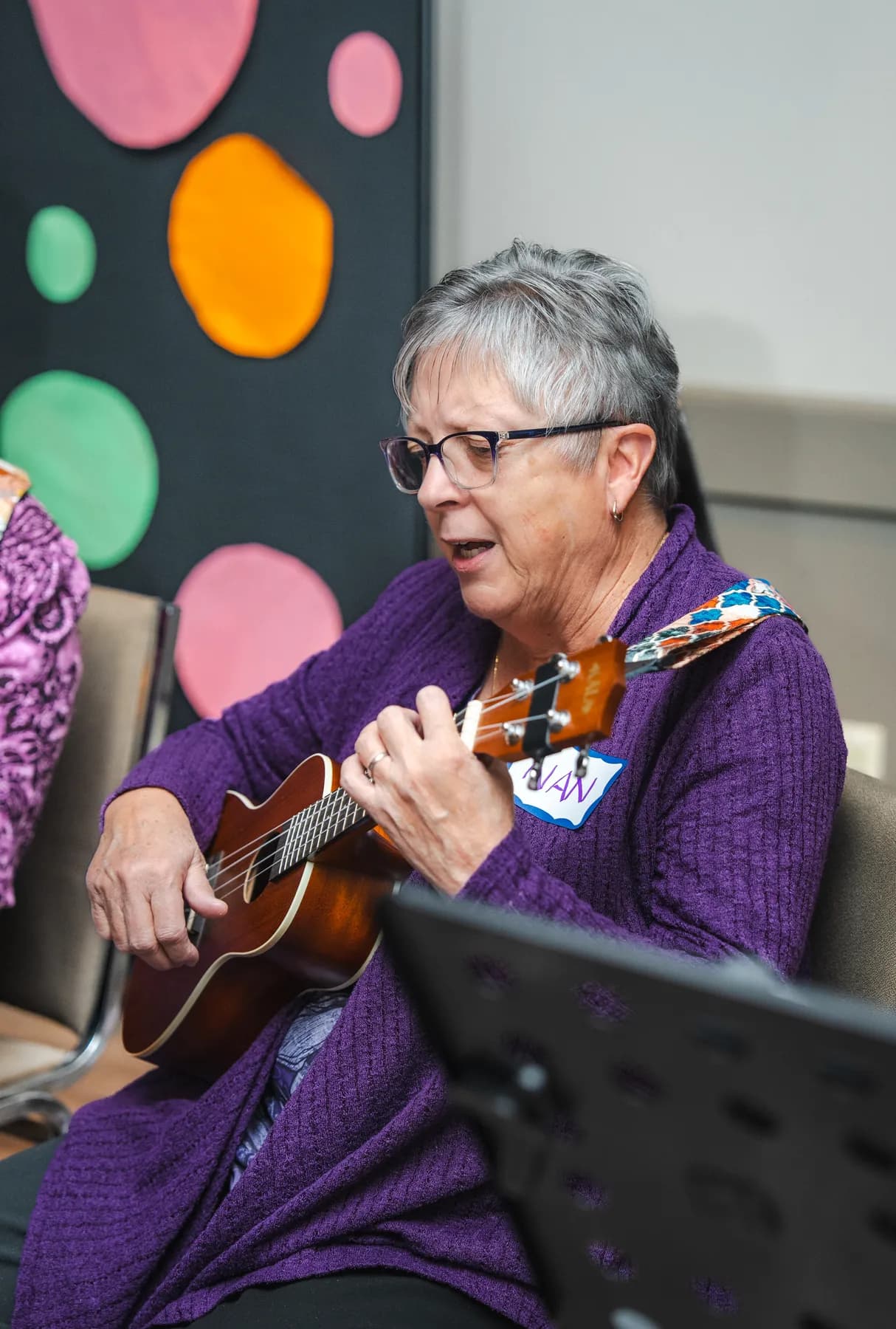 Musicians playing ukuleles at Alison’s birthday celebration.