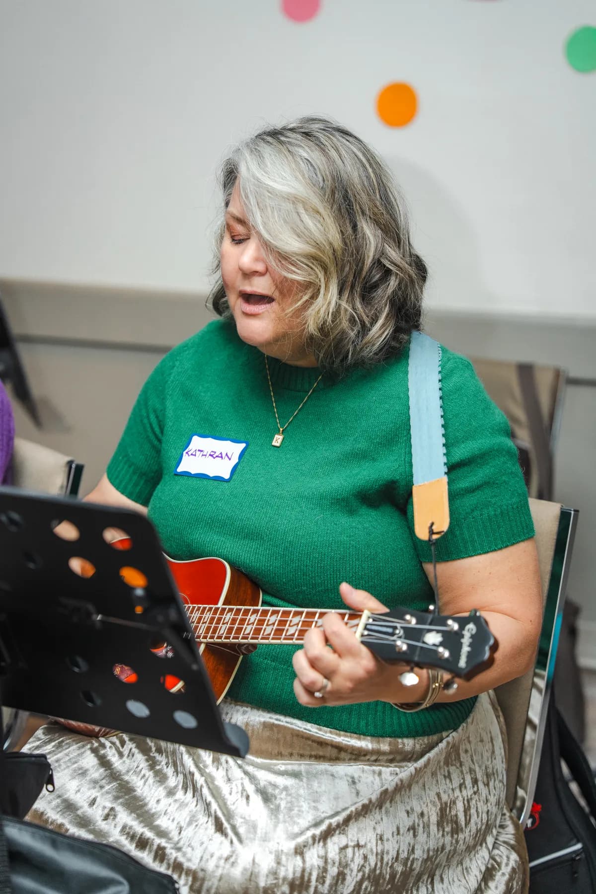 Musicians playing ukuleles at Alison’s birthday celebration.
