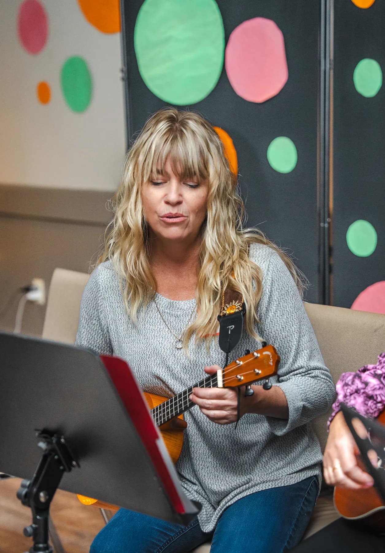 Musicians playing ukuleles at Alison’s birthday celebration.