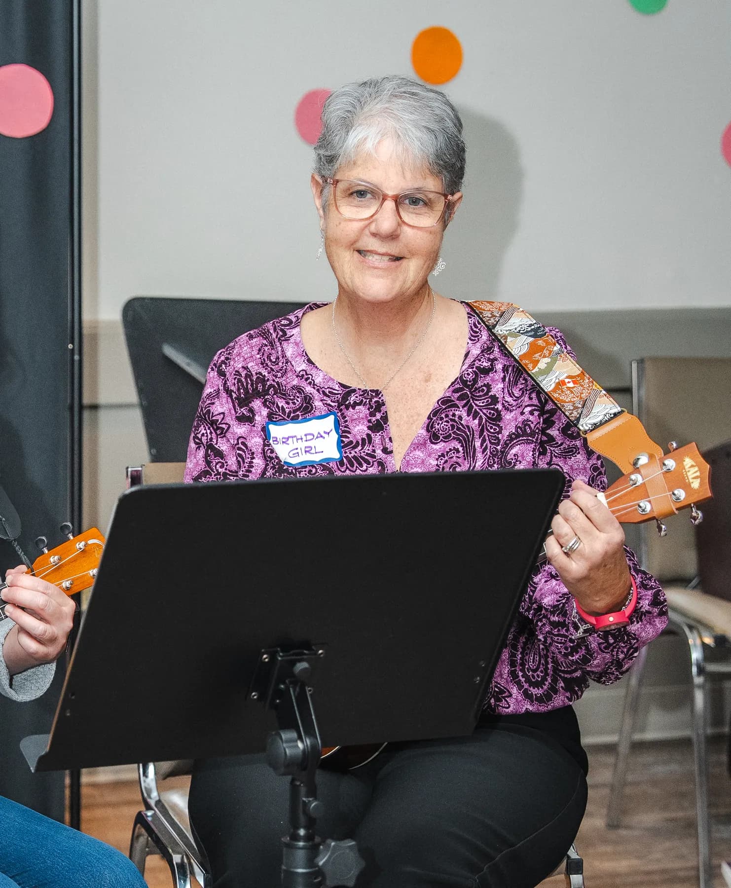 Musicians playing ukuleles at Alison’s birthday celebration.