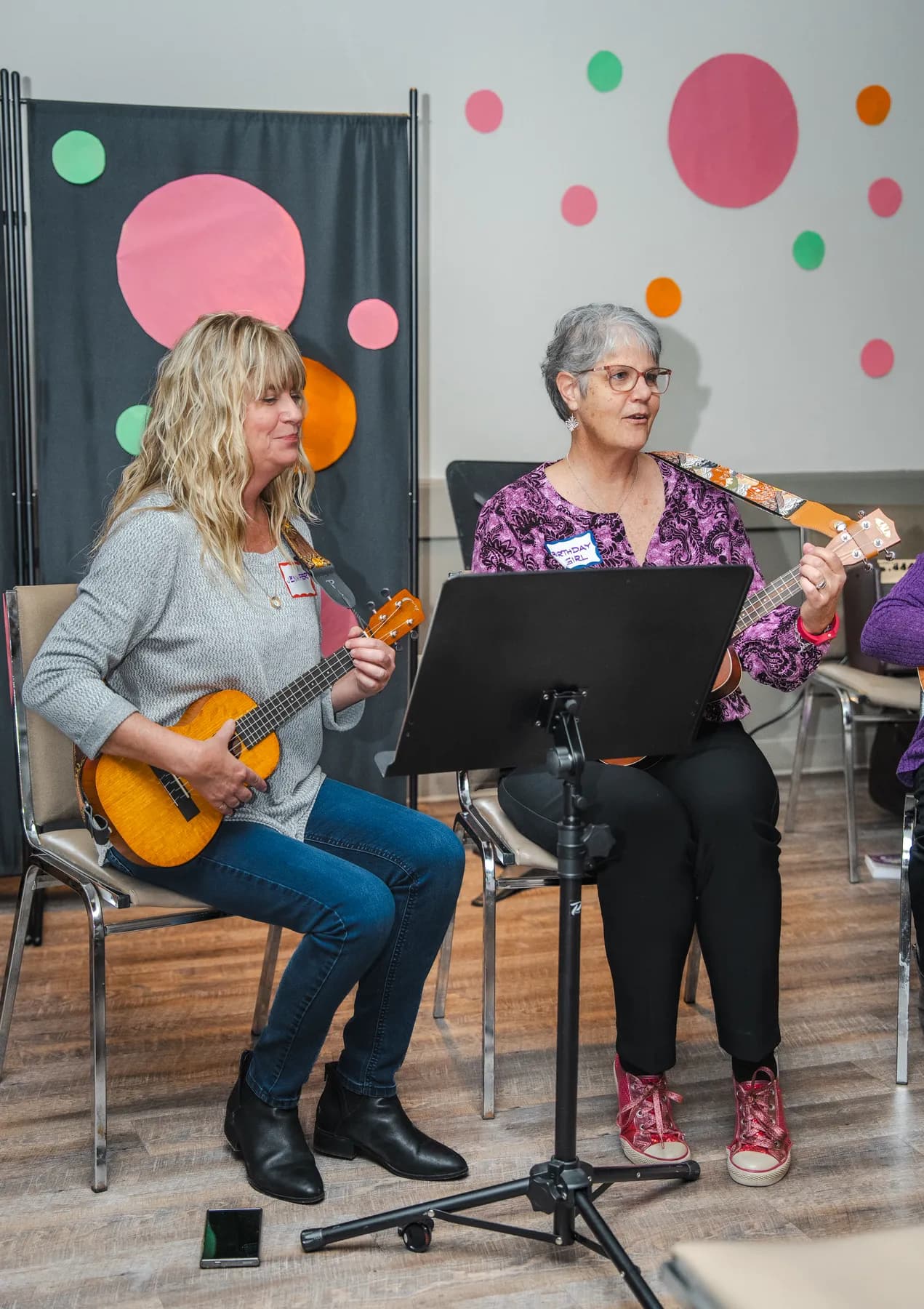 Musicians playing ukuleles at Alison’s birthday celebration.
