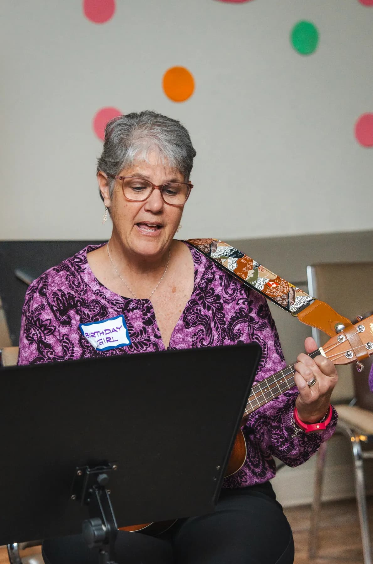Musicians playing ukuleles at Alison’s birthday celebration.