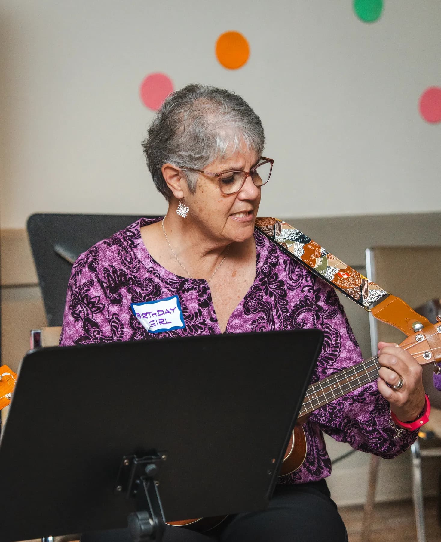 Musicians playing ukuleles at Alison’s birthday celebration.