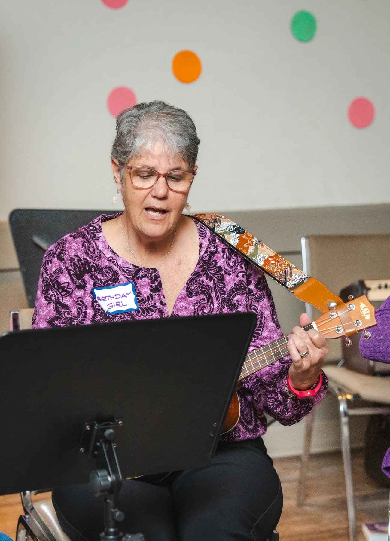 Musicians playing ukuleles at Alison’s birthday celebration.