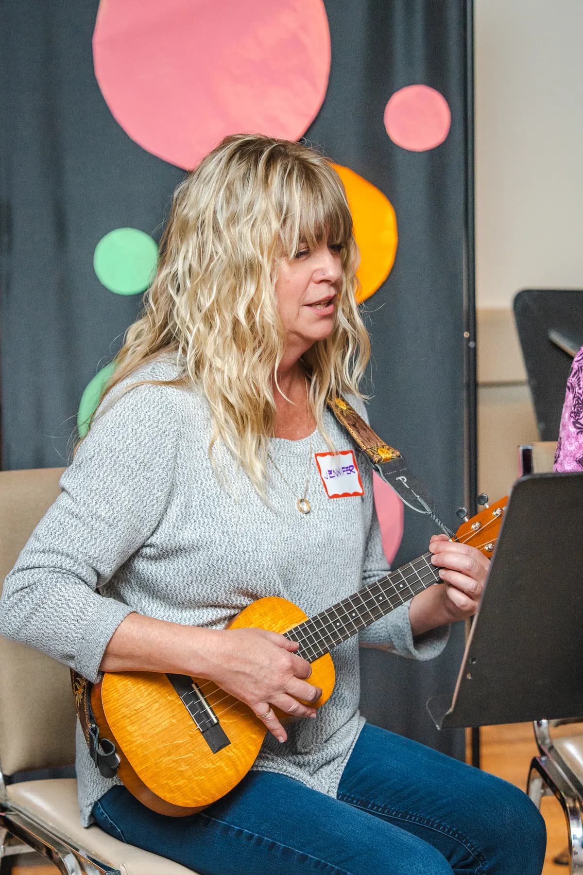 Musicians playing ukuleles at Alison’s birthday celebration.