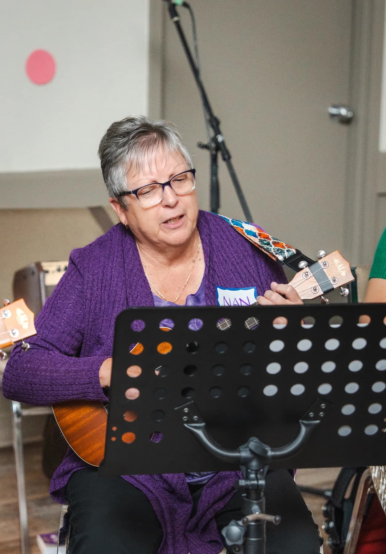 Musicians playing ukuleles at Alison’s birthday celebration.