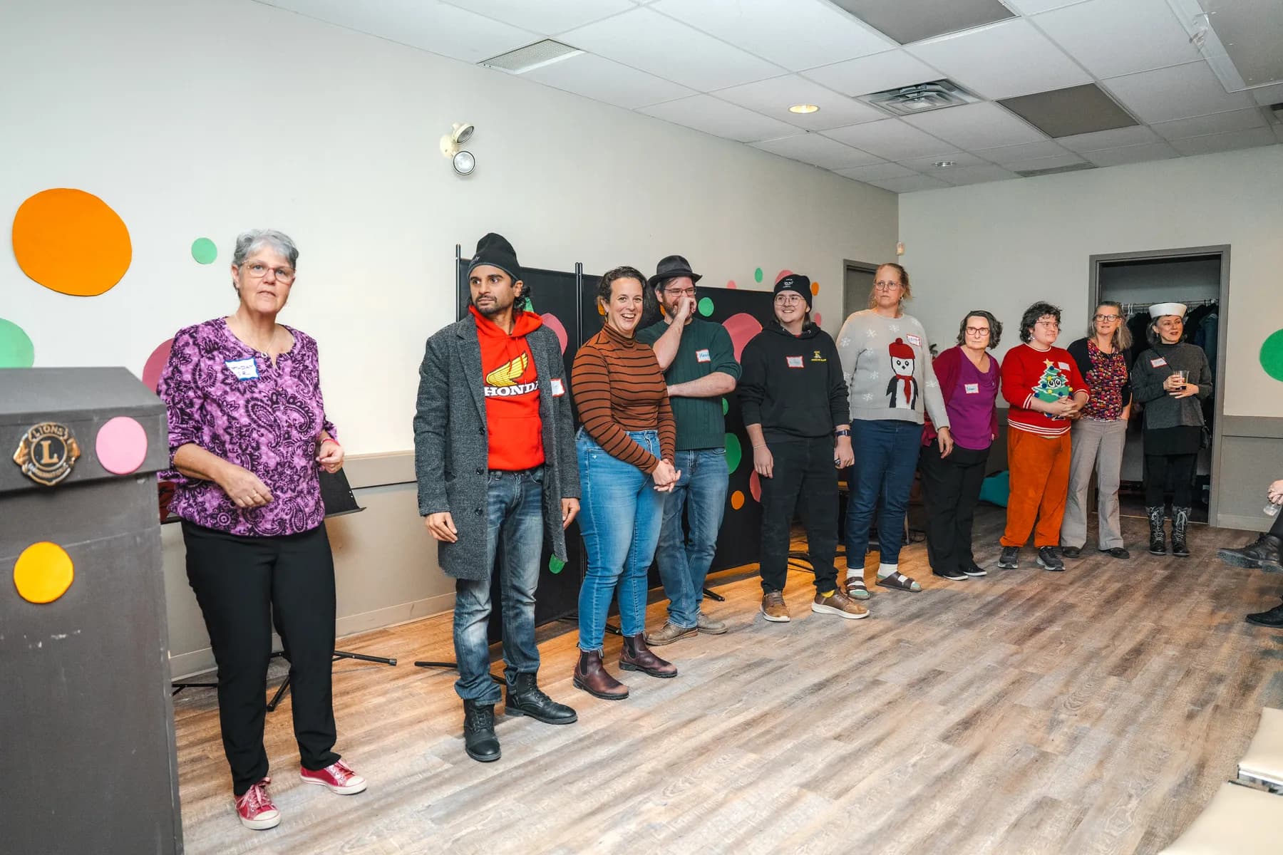 Guests taking part in a playful group performance at Alison’s birthday celebration.