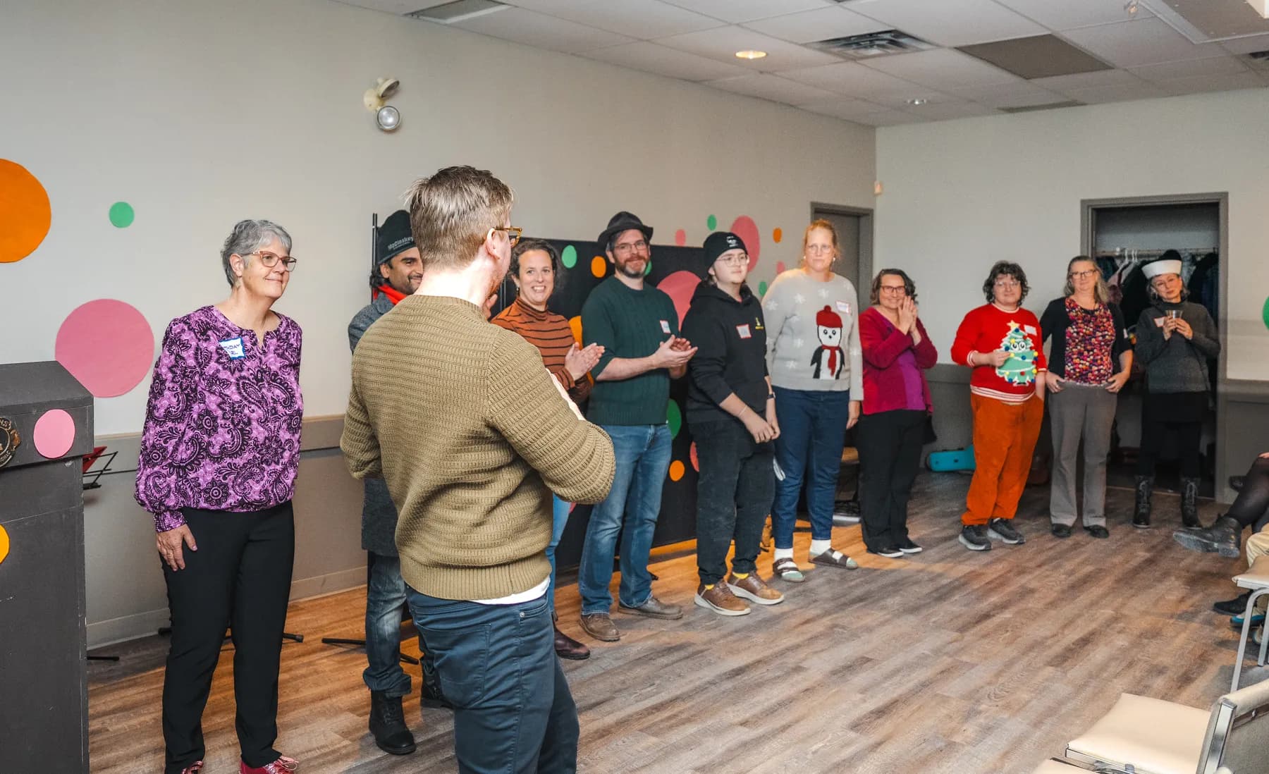 Guests taking part in a playful group performance at Alison’s birthday celebration.