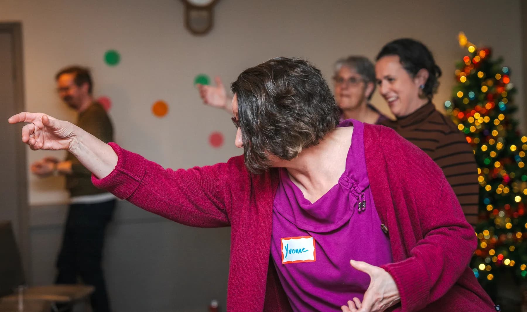 Guests taking part in a playful group performance at Alison’s birthday celebration.