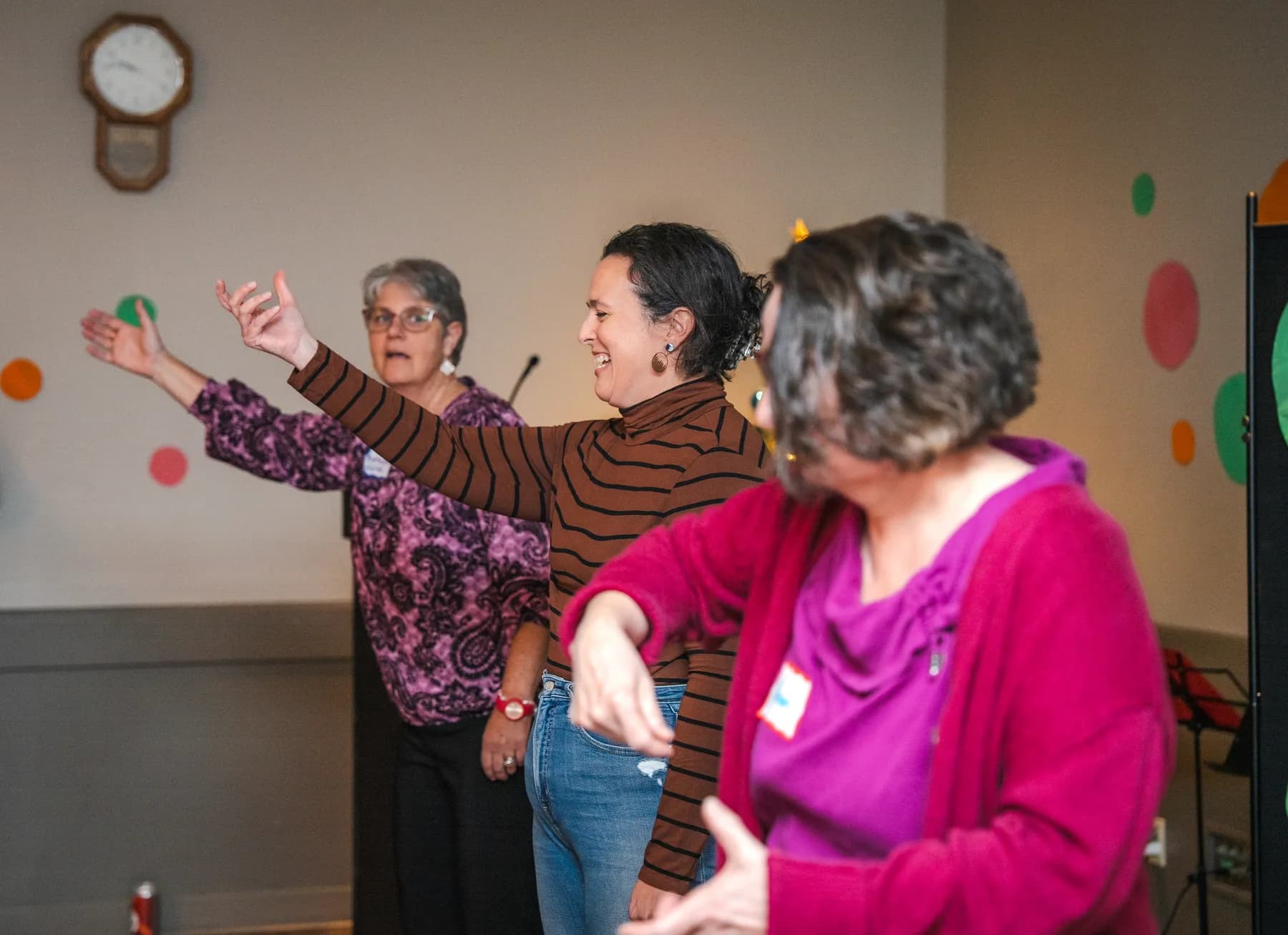 Guests taking part in a playful group performance at Alison’s birthday celebration.