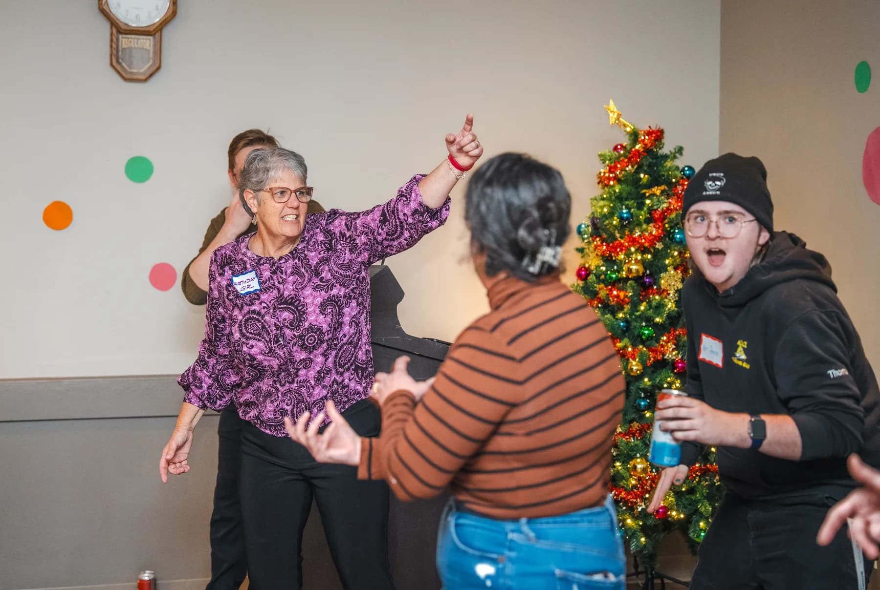 Guests taking part in a playful group performance at Alison’s birthday celebration.