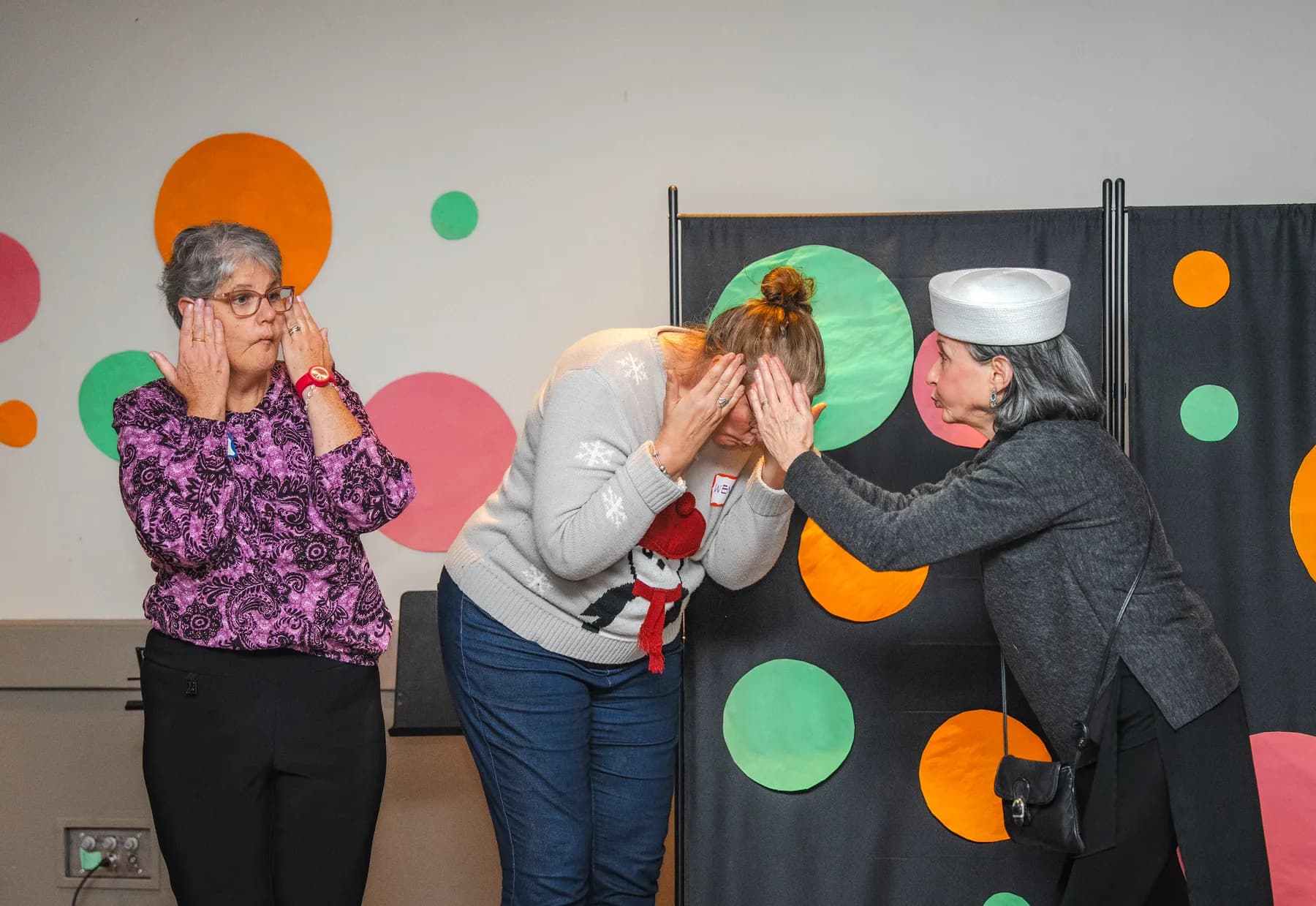 Guests taking part in a playful group performance at Alison’s birthday celebration.