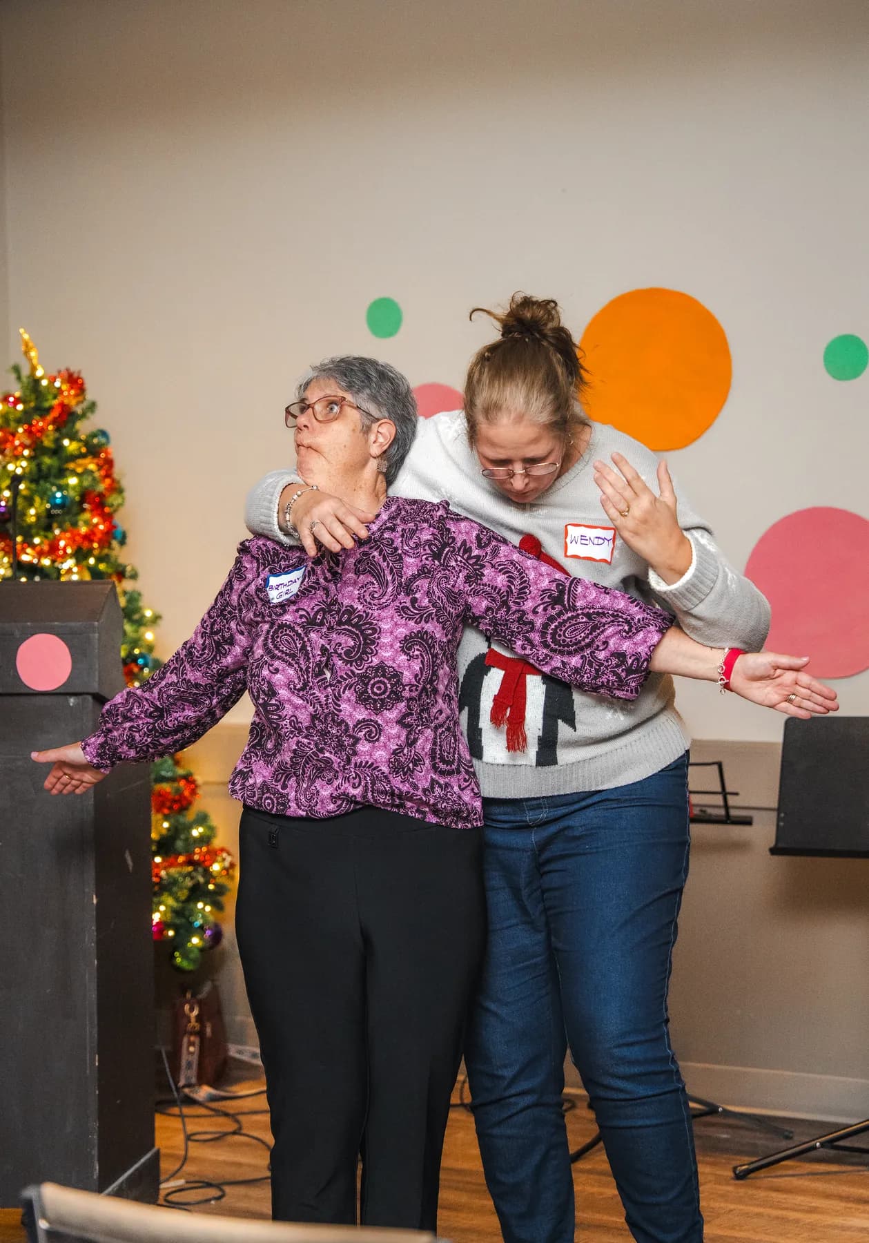 Guests taking part in a playful group performance at Alison’s birthday celebration.