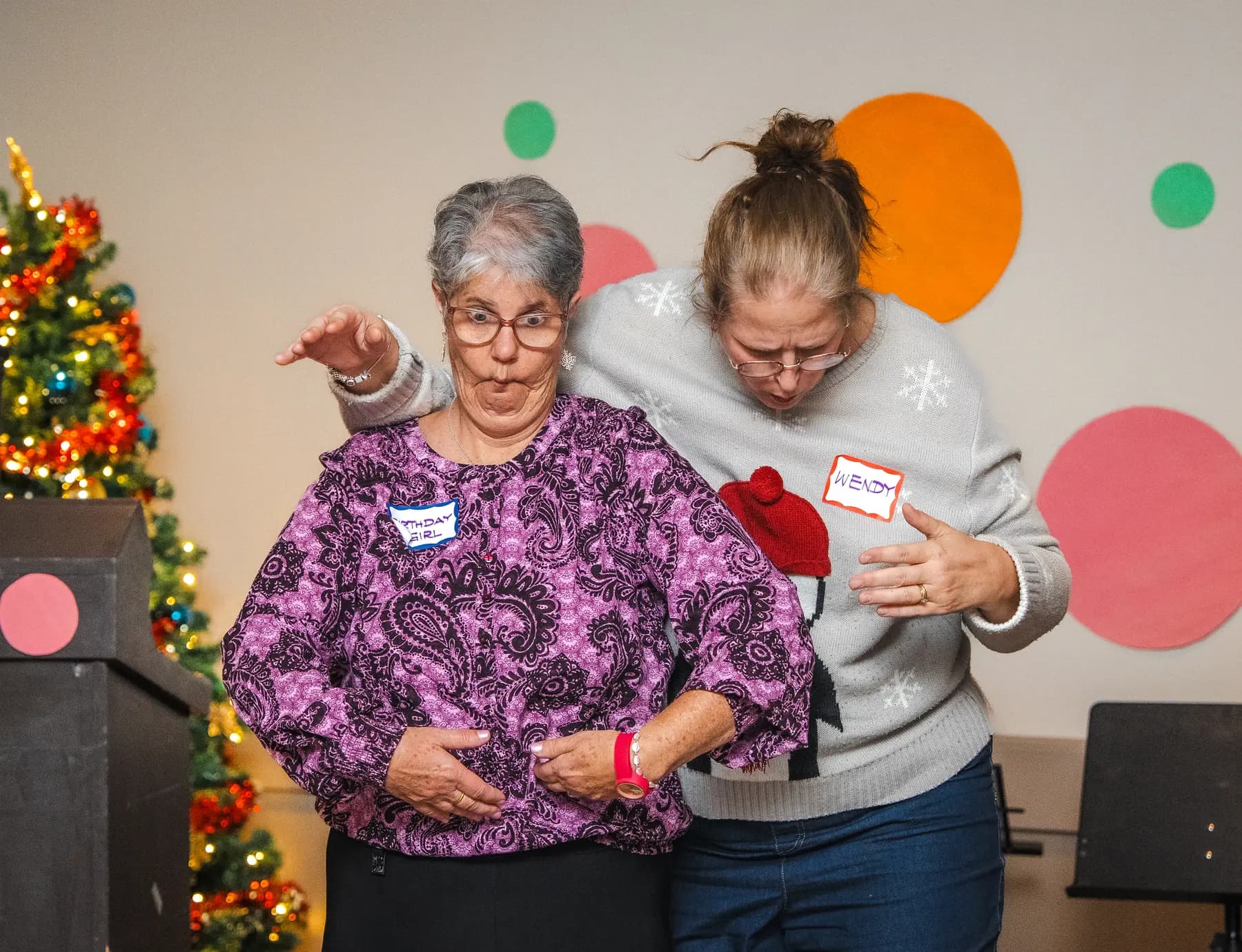 Guests taking part in a playful group performance at Alison’s birthday celebration.