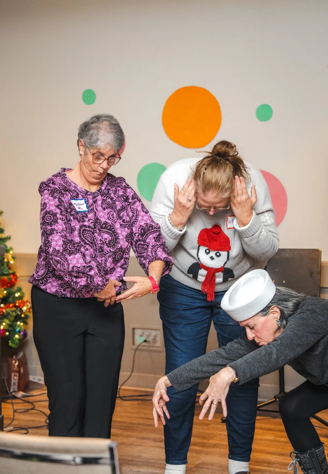 Guests taking part in a playful group performance at Alison’s birthday celebration.