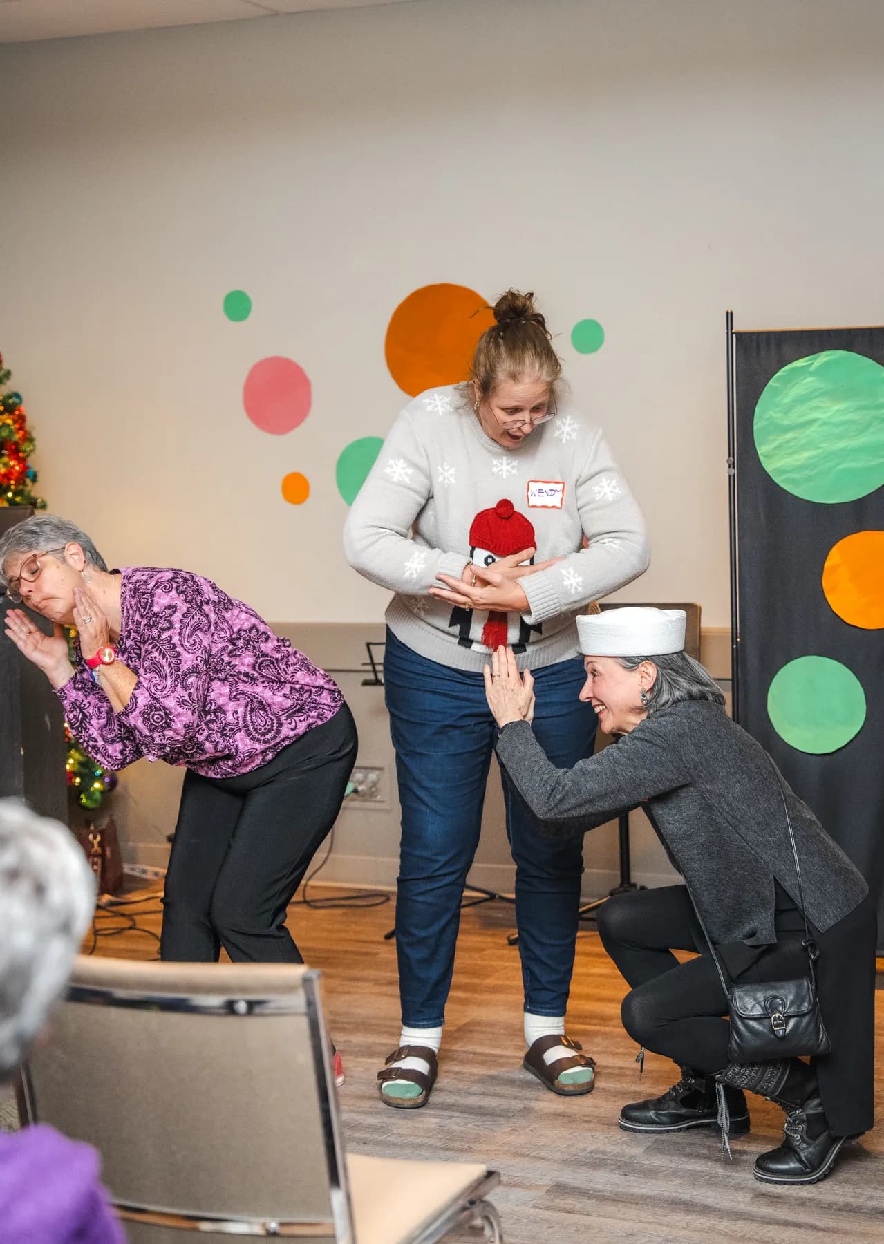 Guests taking part in a playful group performance at Alison’s birthday celebration.