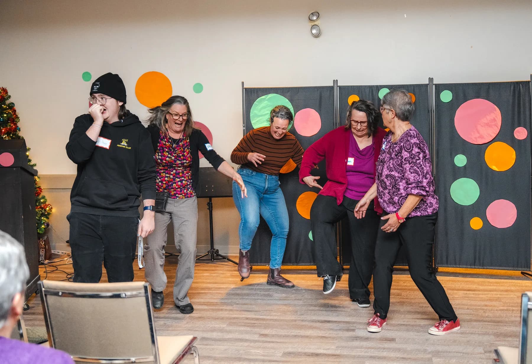 Guests taking part in a group performance at Alison’s birthday celebration.