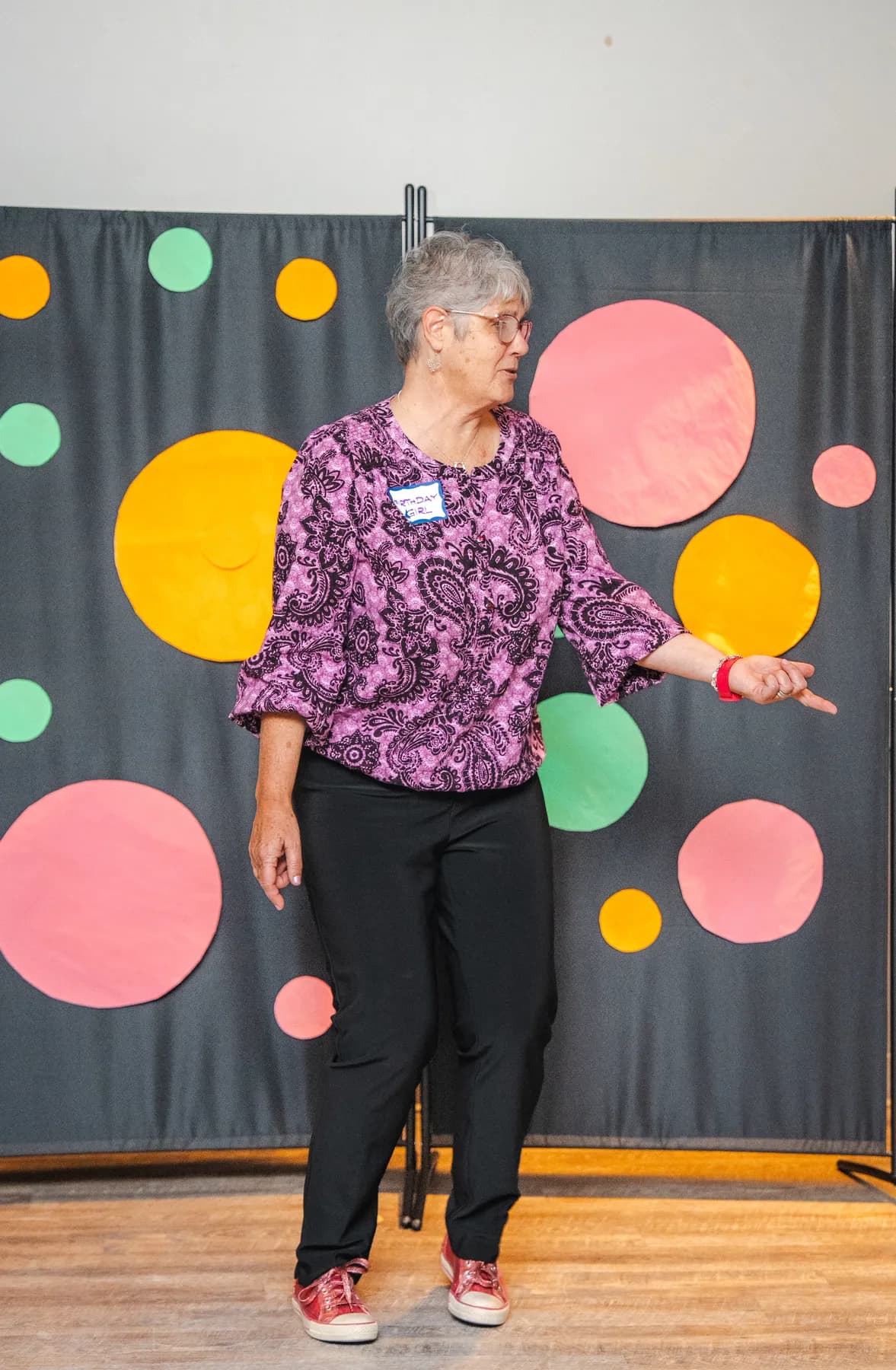 A woman addressing the guests at Alison’s birthday celebration.
