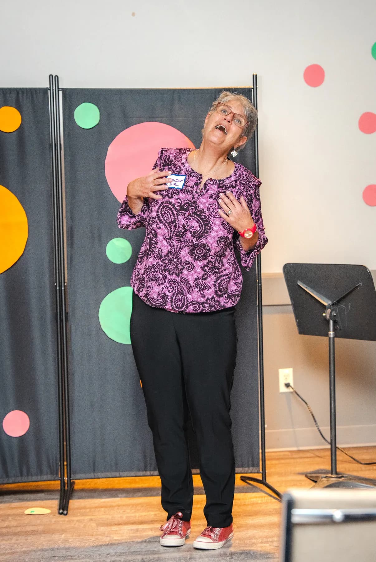 A woman addressing the guests at Alison’s birthday celebration.