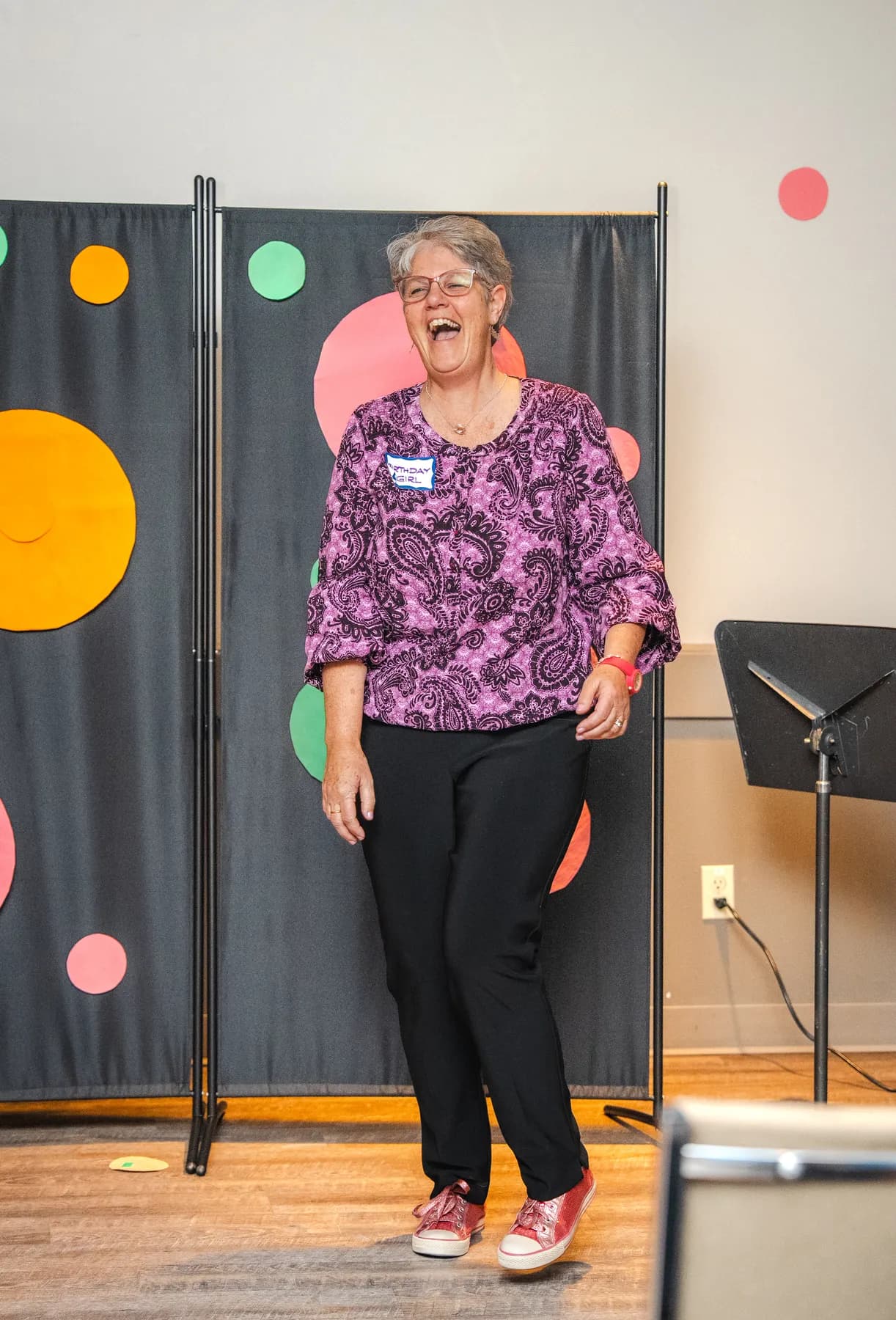 A woman addressing the guests at Alison’s birthday celebration.