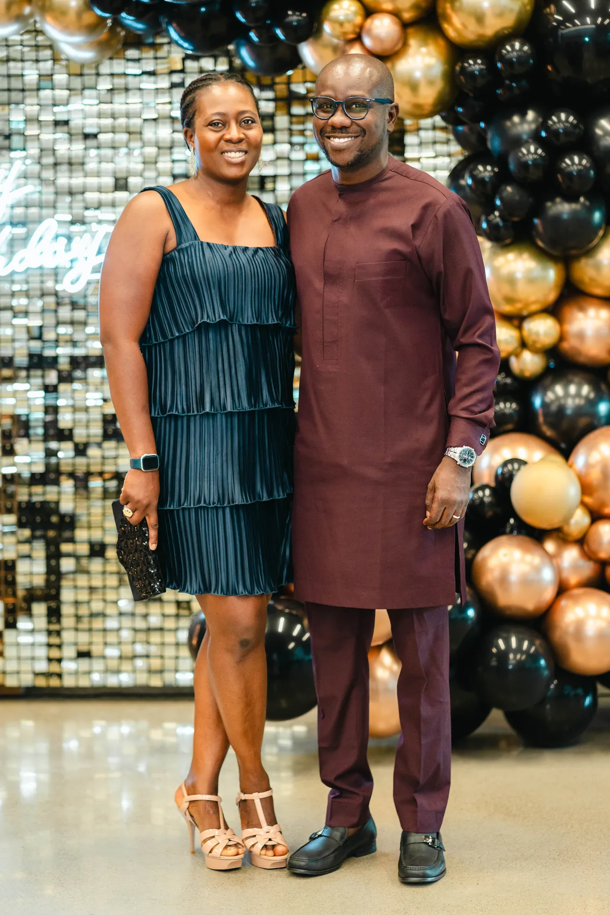 Two guests posing together at BJ’s 40th birthday party.