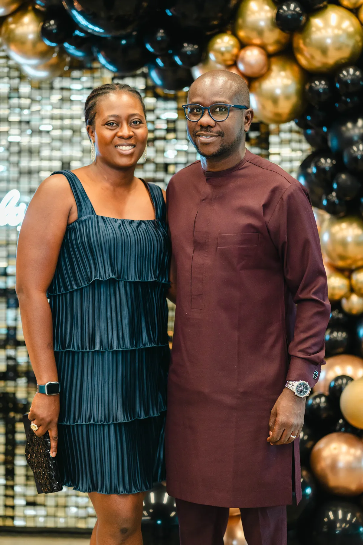 Two guests posing together at BJ’s 40th birthday party.