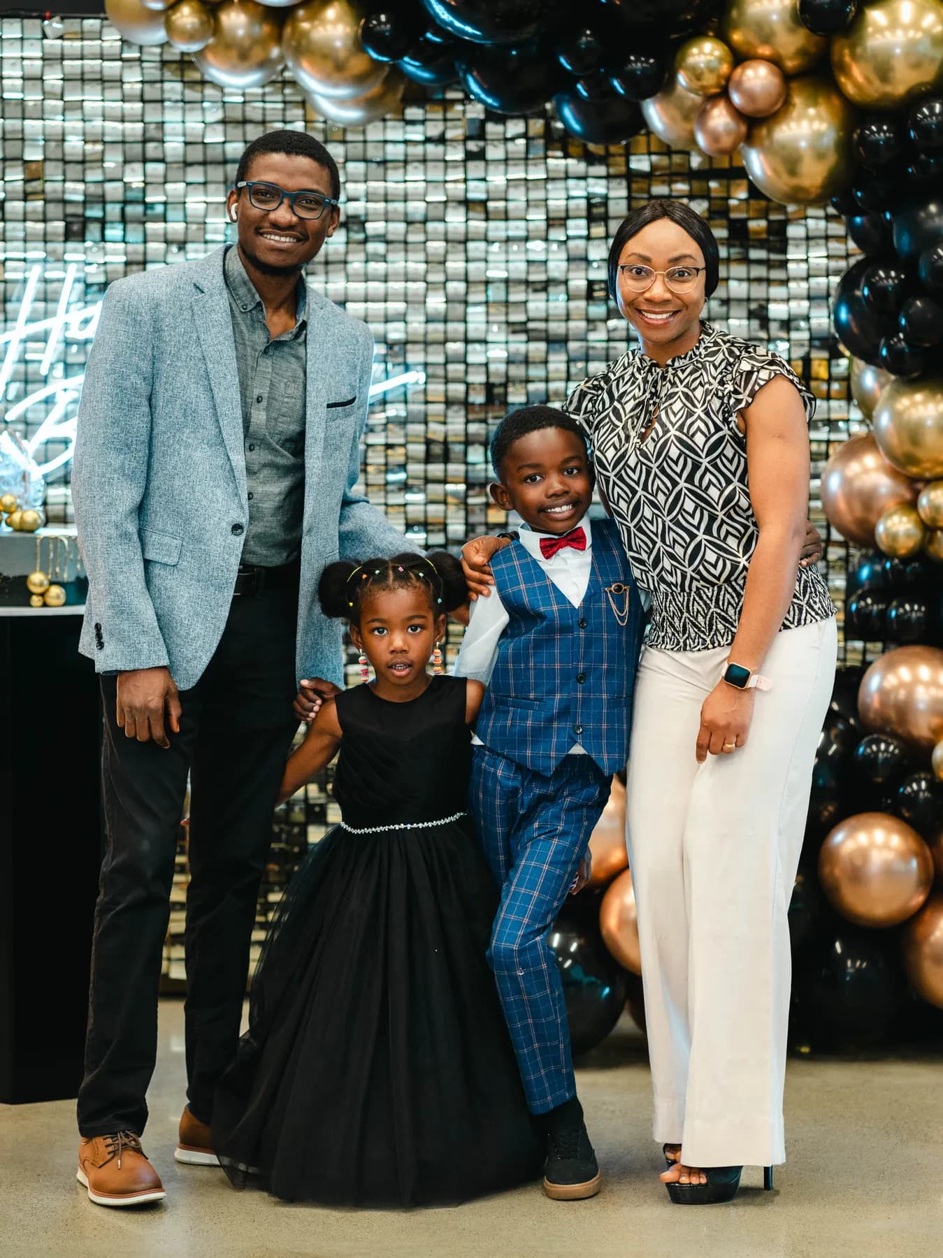A family posing together at BJ’s 40th birthday party.