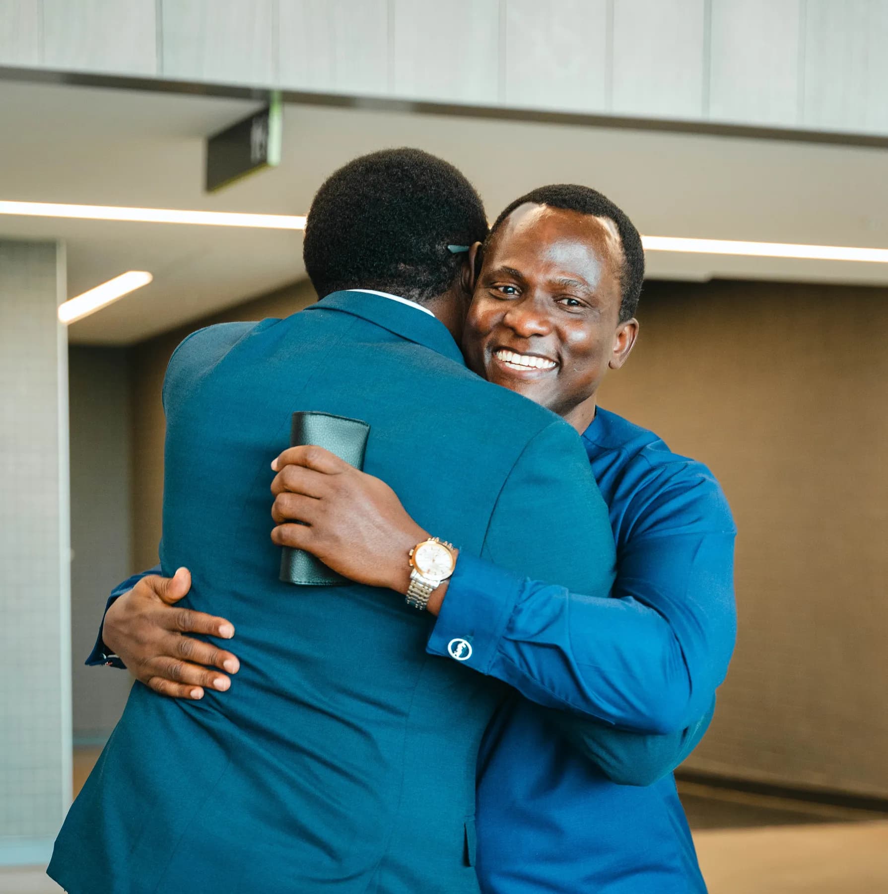Guests sharing a hug at BJ’s 40th birthday party.