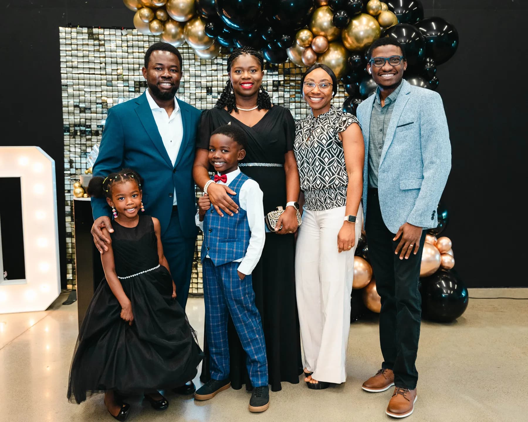 Guests posing together at BJ’s 40th birthday party.