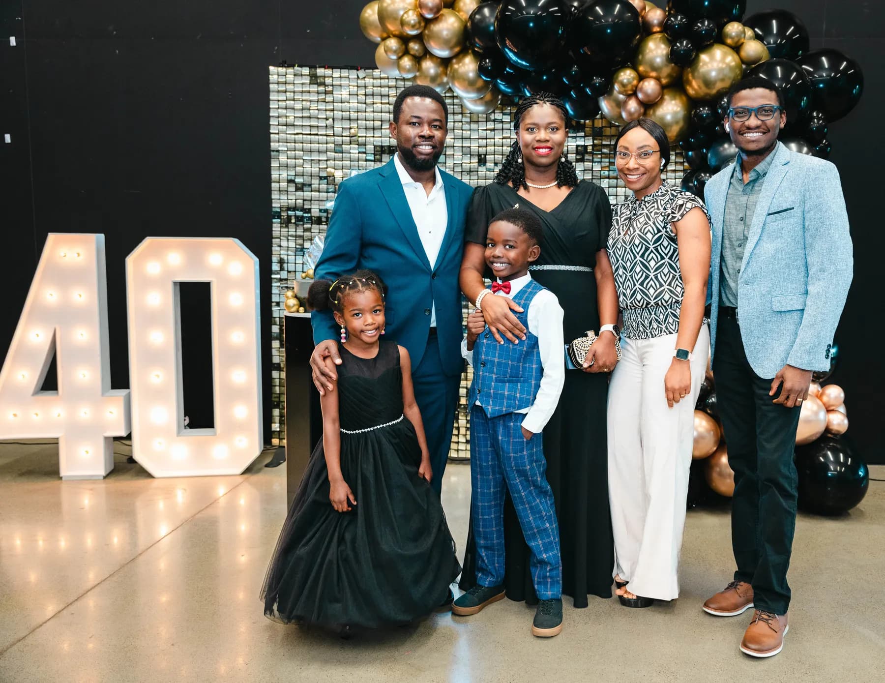 Guests posing together at BJ’s 40th birthday party.