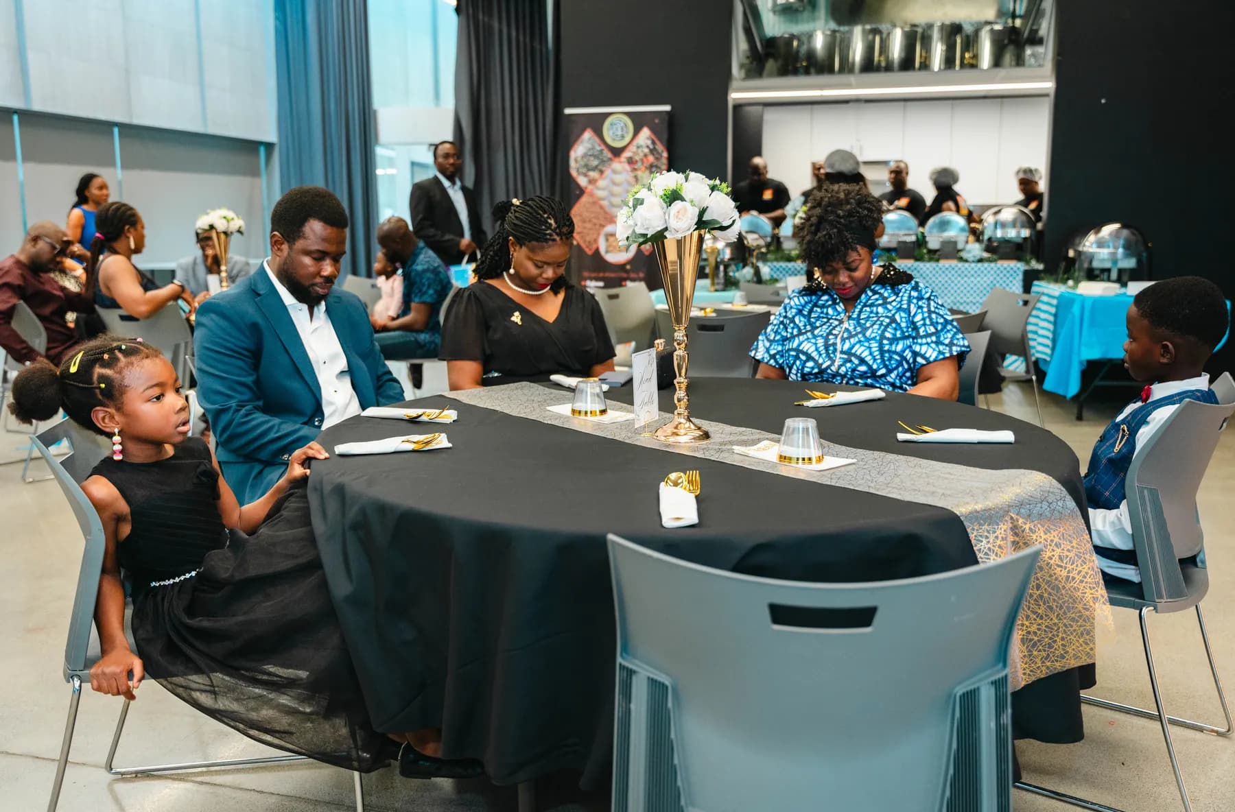 Guests seated around the party tables at BJ’s 40th birthday party.