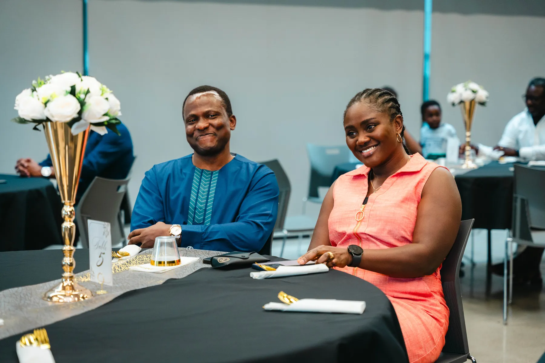 Guests watching the celebration from their tables at BJ’s 40th birthday party.