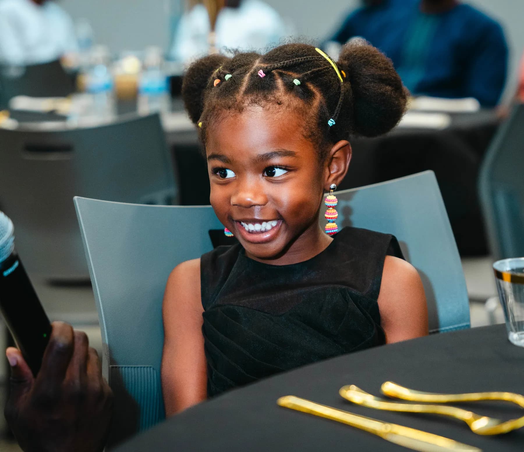 A child smiling at BJ’s 40th birthday party.