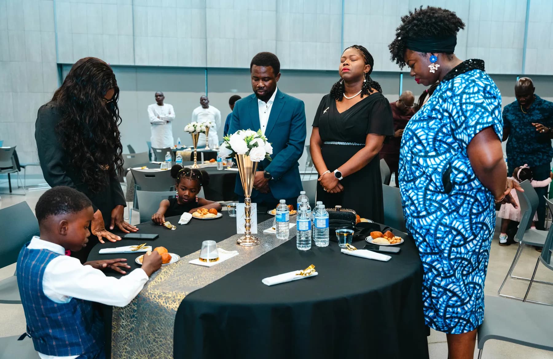 Guests gathered around the party tables at BJ’s 40th birthday party.