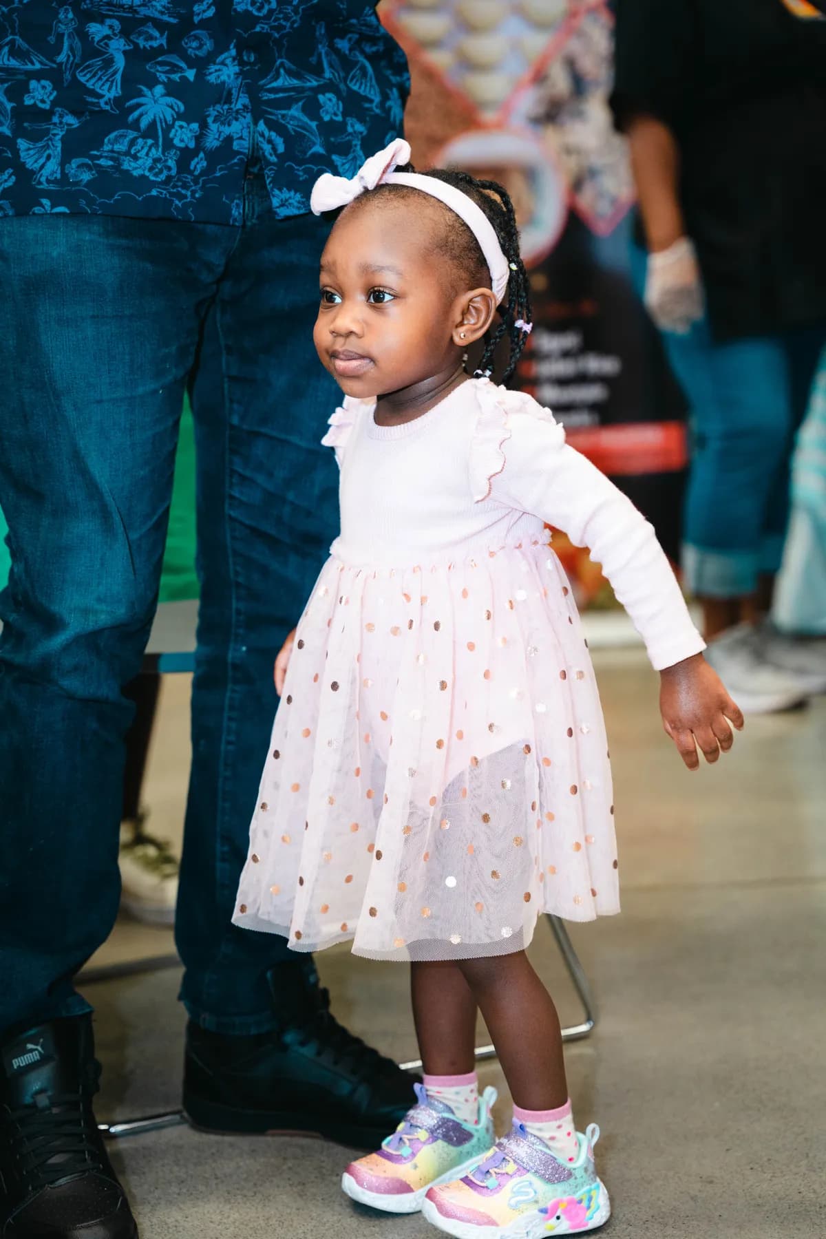 A portrait of a child at BJ’s 40th birthday party.