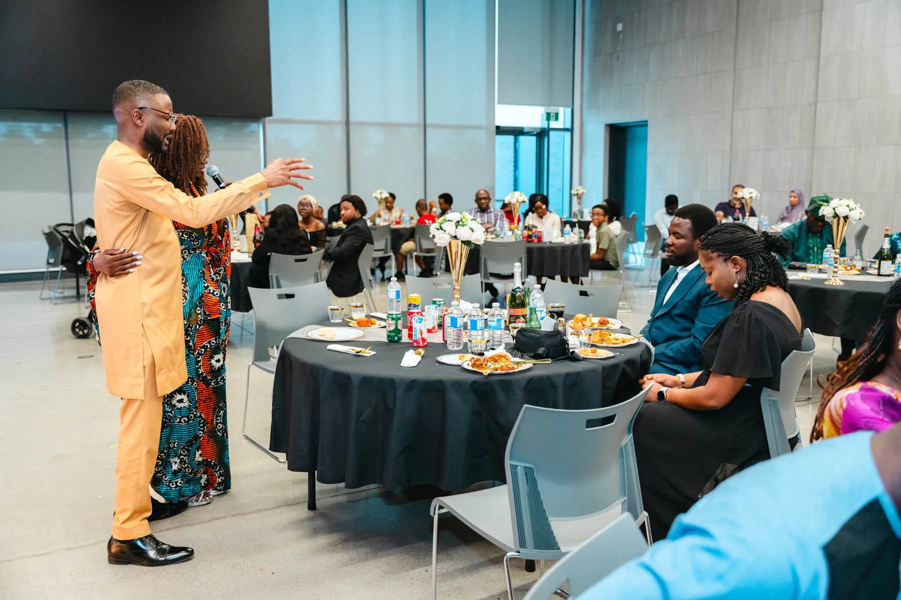 A woman addressing the party guests at BJ’s 40th birthday party.