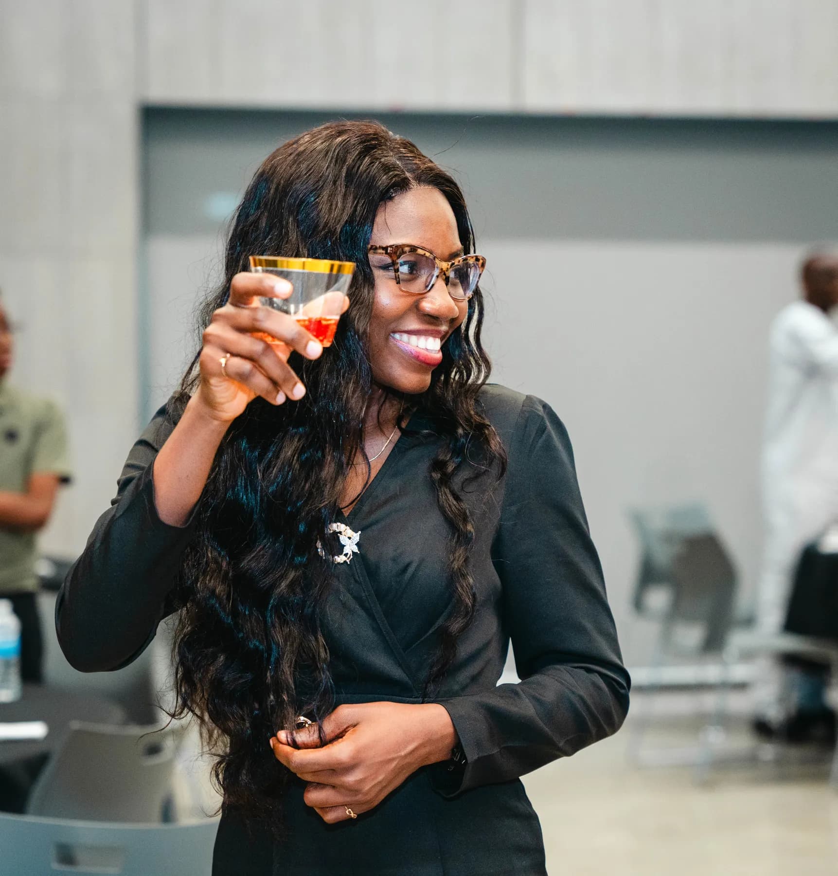 Guests raising their glasses for a toast at BJ’s 40th birthday party.