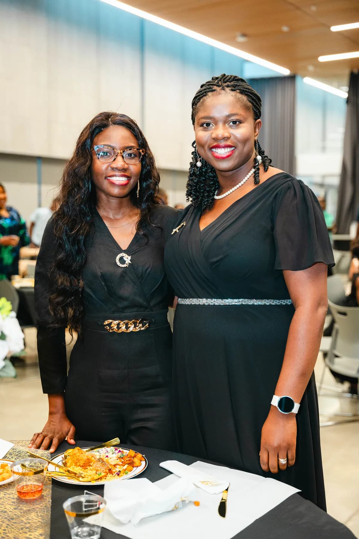 Two women posing together at BJ’s 40th birthday party.