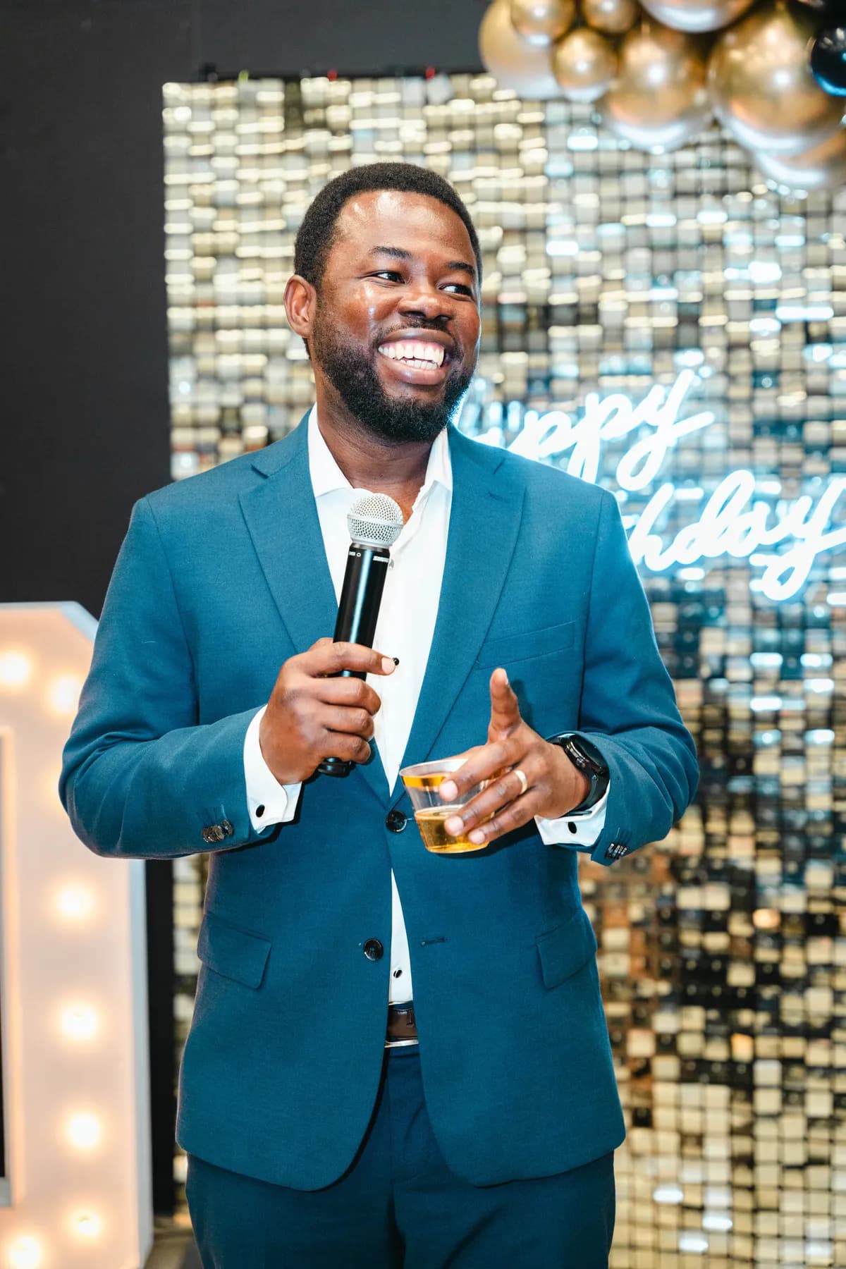 A man giving a speech at BJ’s 40th birthday party.