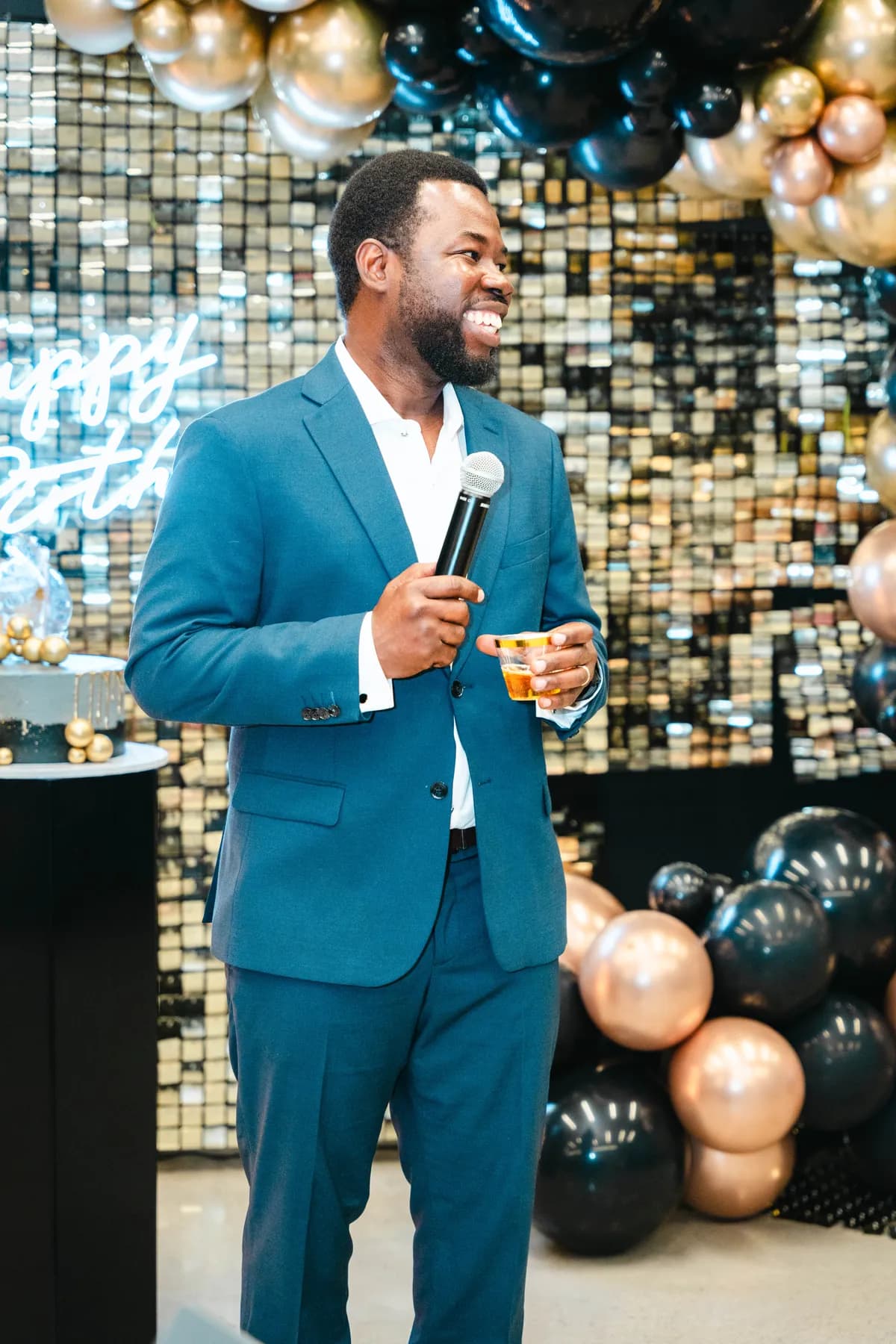 A man giving a speech at BJ’s 40th birthday party.