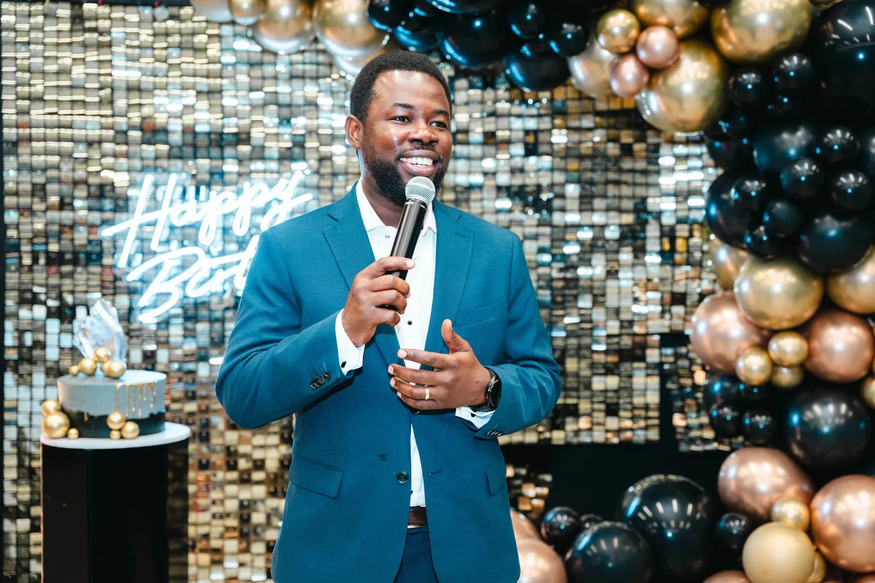 A man giving a speech at BJ’s 40th birthday party.
