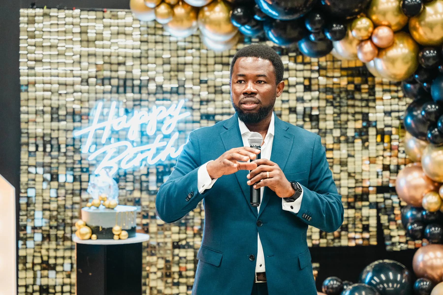 A man giving a speech at BJ’s 40th birthday party.